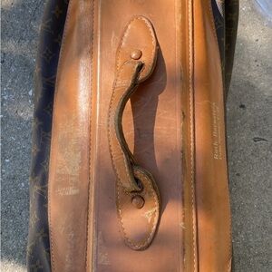 Louie Vuitton. Older luggage. In great shape.